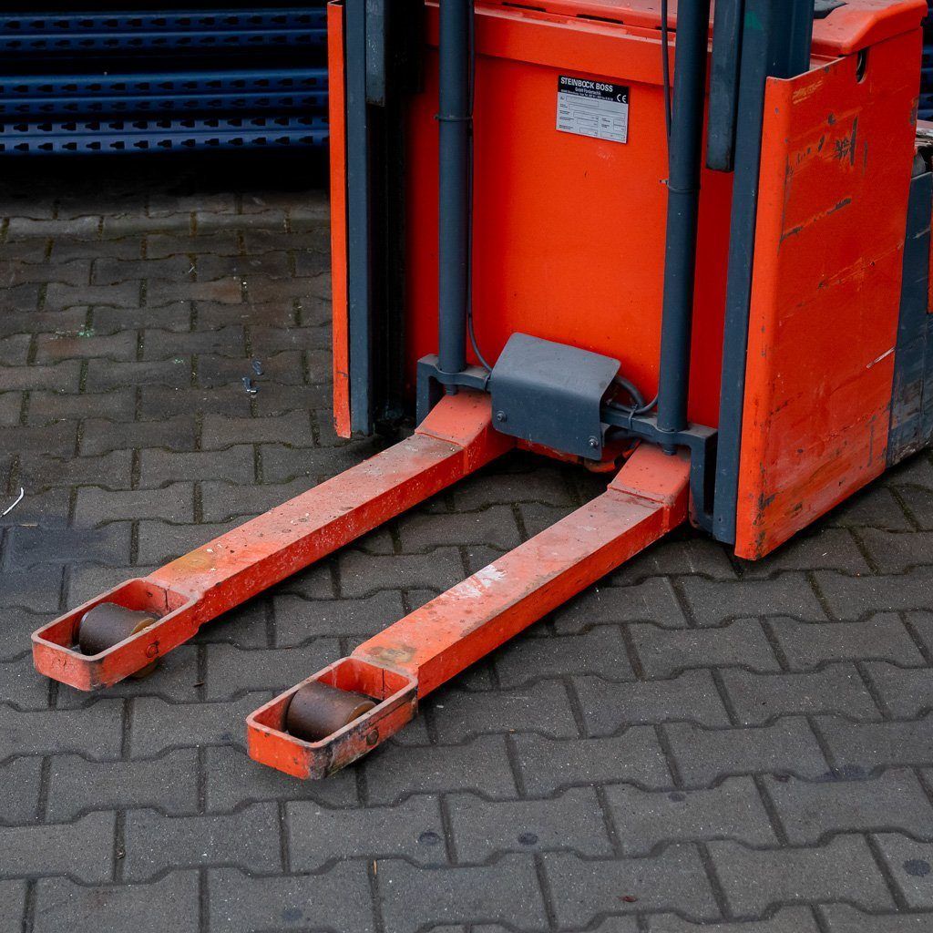 wózek paletowy, paleciak elektryczny, wózek podnośnikowy, wózek elektryczny, paleciak z prostownikiem, wózek do regałów, wóżek podnośnikowy do magazynu, wóżek elektryczny z masztem, podnośnik do palet, wózek paletowy z baterią